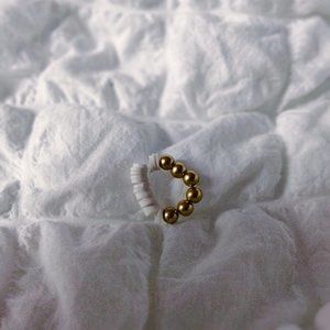 Gold and white half ring